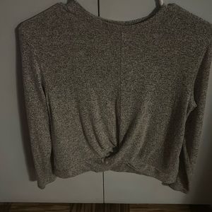 This is a grey plane  long sleeve shirt it is that has a inseam in the front